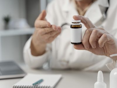 male-doctor-prescribing-pills-patient